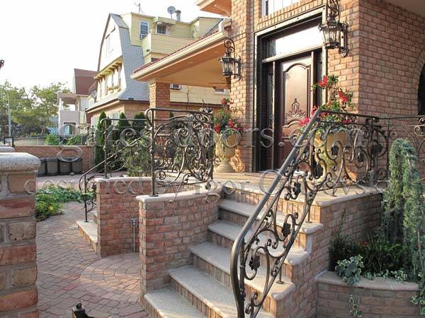 Brick house with custom-built iron railings